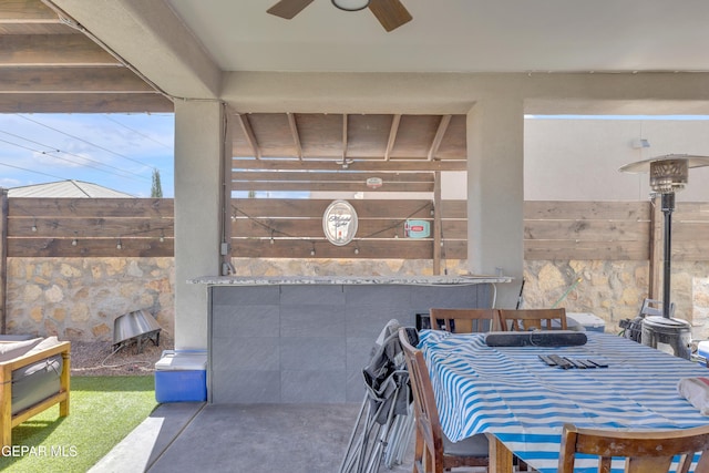 view of patio / terrace with a ceiling fan