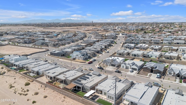bird's eye view with a residential view and a mountain view