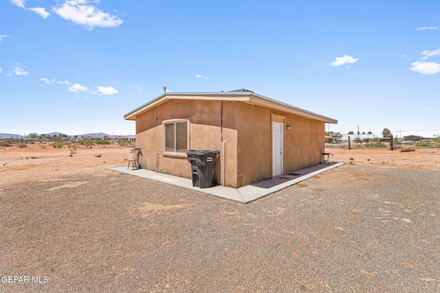 exterior space featuring a mountain view