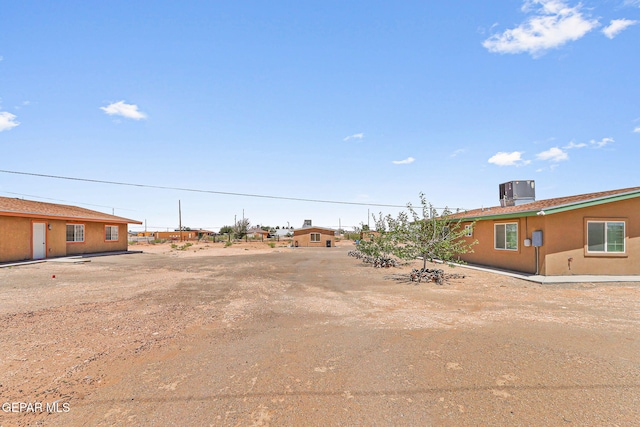 view of yard featuring central AC unit