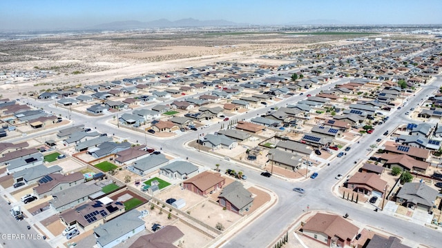 bird's eye view featuring a residential view and a mountain view