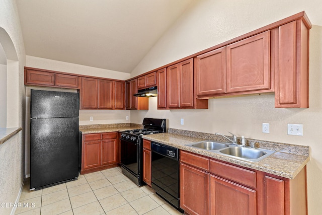 kitchen featuring a sink, light tile patterned floors, lofted ceiling, under cabinet range hood, and black appliances