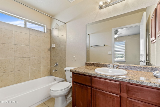 bathroom featuring vanity,  shower combination, tile patterned floors, and toilet
