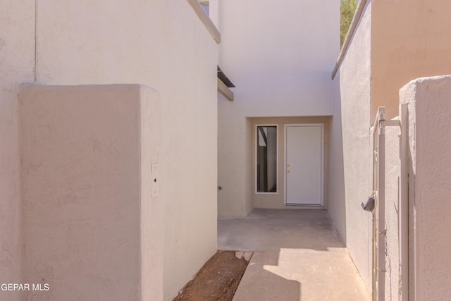 1721 Villa Santos Cir, El Paso, TX 79935 - doorway to property with stucco siding and a patio area