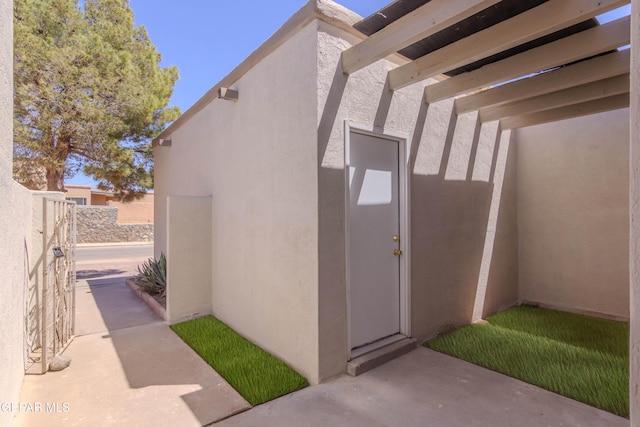 1721 Villa Santos Cir, El Paso, TX 79935 - view of side of property featuring fence and stucco siding