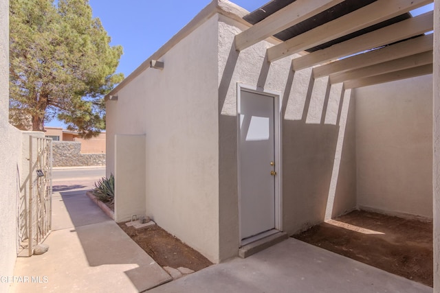 1721 Villa Santos Cir, El Paso, TX 79935 - exterior space featuring stucco siding and fence