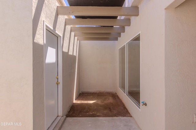 1721 Villa Santos Cir, El Paso, TX 79935 - interior space featuring a textured wall and unfinished concrete flooring