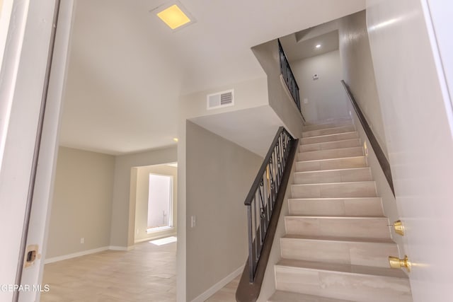 1721 Villa Santos Cir, El Paso, TX 79935 - stairs with baseboards, recessed lighting, and visible vents