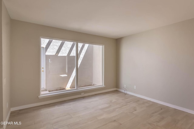 1721 Villa Santos Cir, El Paso, TX 79935 - empty room with baseboards and light wood-style flooring