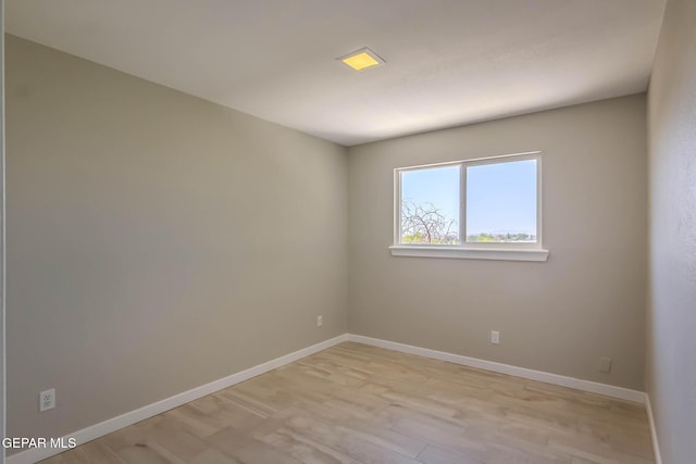 1721 Villa Santos Cir, El Paso, TX 79935 - spare room featuring baseboards and light wood finished floors