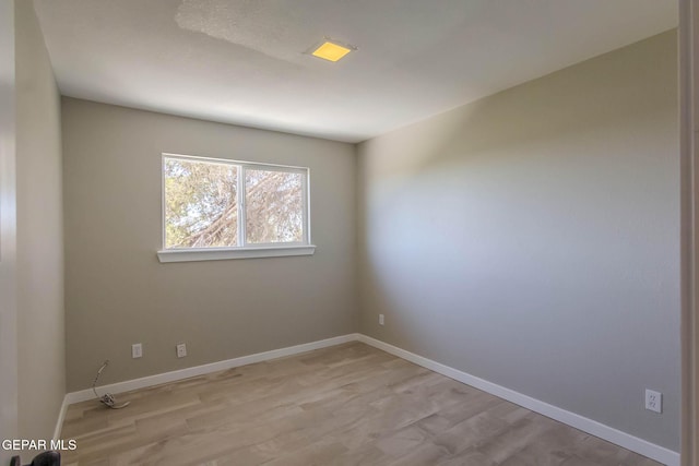 1721 Villa Santos Cir, El Paso, TX 79935 - spare room with light wood-style floors and baseboards