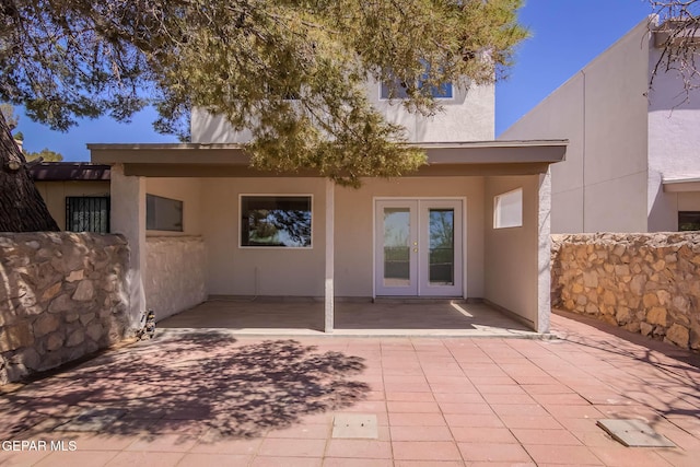1721 Villa Santos Cir, El Paso, TX 79935 - rear view of property with a patio, stucco siding, and french doors