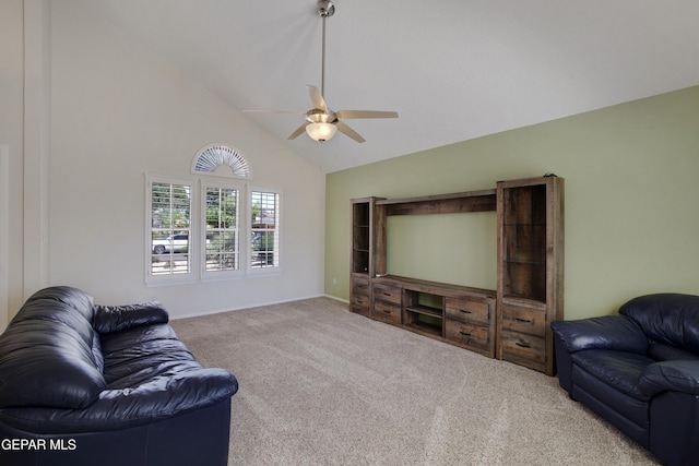 living room featuring carpet floors, baseboards, ceiling fan, and high vaulted ceiling