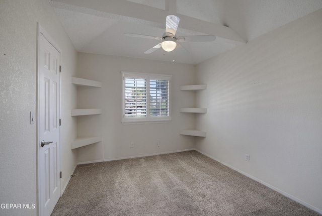 unfurnished bedroom featuring baseboards, carpet, and a ceiling fan
