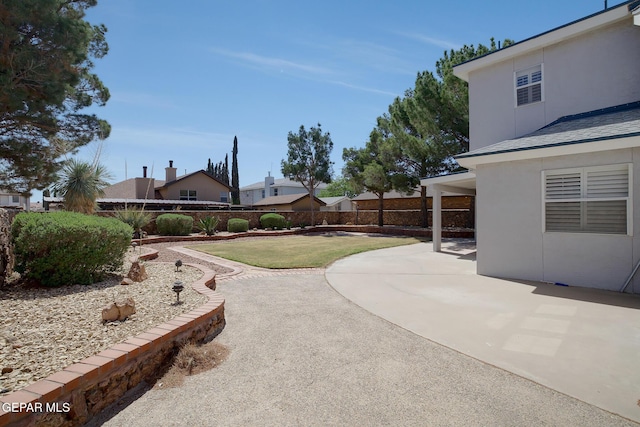 view of yard featuring a fenced backyard and a patio