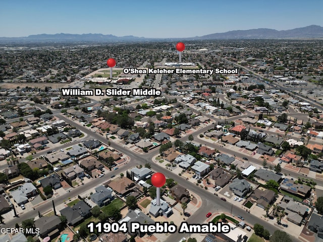 bird's eye view featuring a mountain view and a residential view