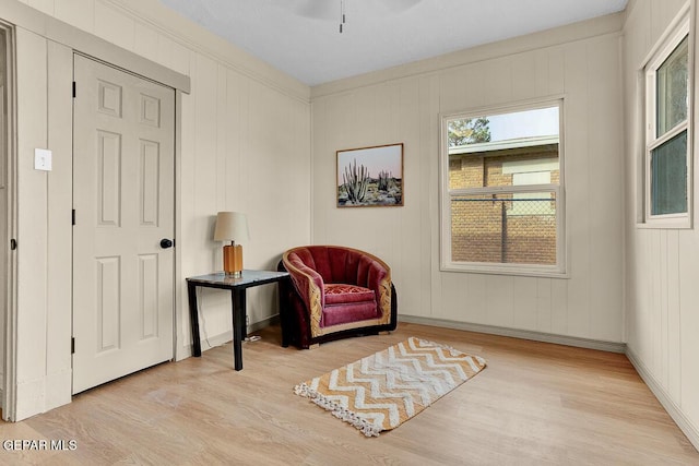 2723 Grant Ave, El Paso, TX 79930 - sitting room featuring wood finished floors, ceiling fan, and baseboards