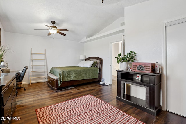 2709 Granite Rock Pl, El Paso, TX 79938 - bedroom with visible vents, ceiling fan, dark wood-style floors, a textured ceiling, and vaulted ceiling