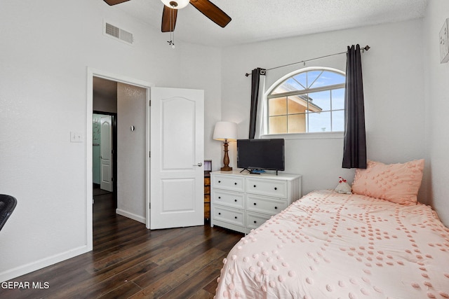 2709 Granite Rock Pl, El Paso, TX 79938 - bedroom with ceiling fan, visible vents, baseboards, and dark wood-type flooring