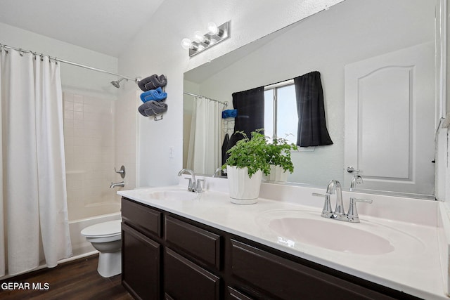 2709 Granite Rock Pl, El Paso, TX 79938 - full bath with a sink, toilet, double vanity, and wood finished floors