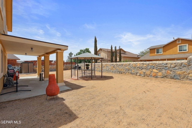 2709 Granite Rock Pl, El Paso, TX 79938 - view of yard featuring a gazebo, a fenced backyard, and a patio area