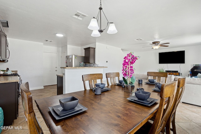 2709 Granite Rock Pl, El Paso, TX 79938 - dining room featuring light tile patterned floors, ceiling fan, and visible vents