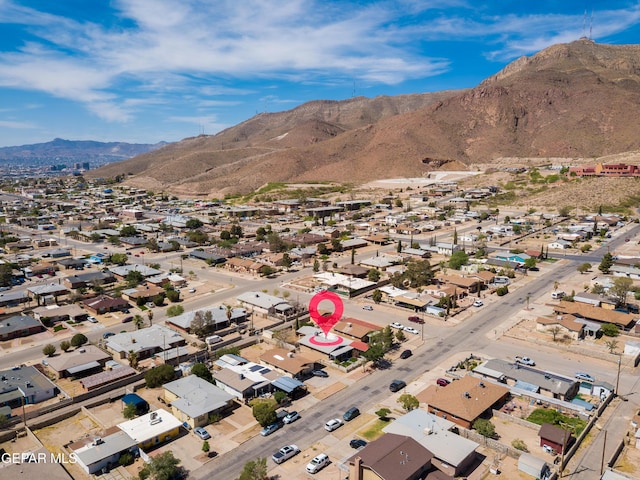 bird's eye view with a residential view and a mountain view