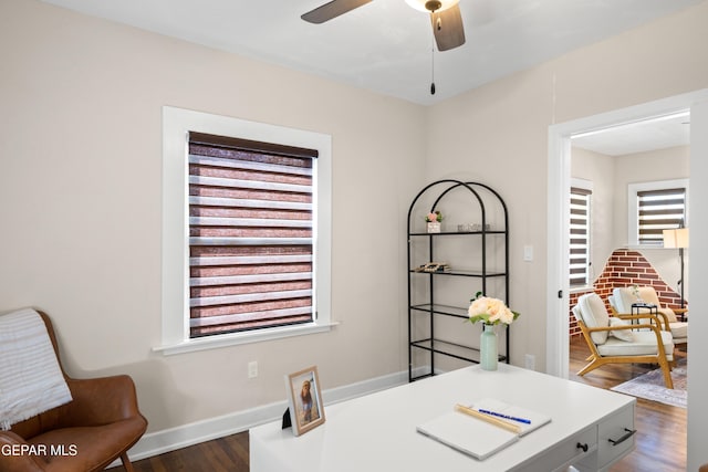 home office featuring baseboards, dark wood-style flooring, and ceiling fan