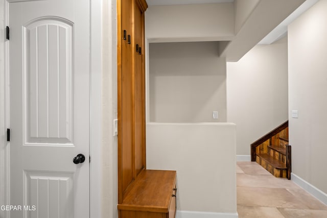 mudroom featuring baseboards