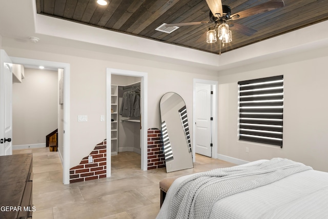 bedroom with wooden ceiling, a raised ceiling, baseboards, and recessed lighting