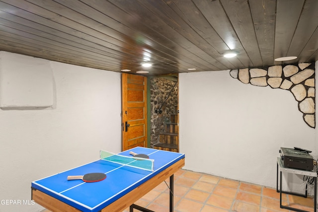 playroom featuring wood ceiling and tile patterned floors