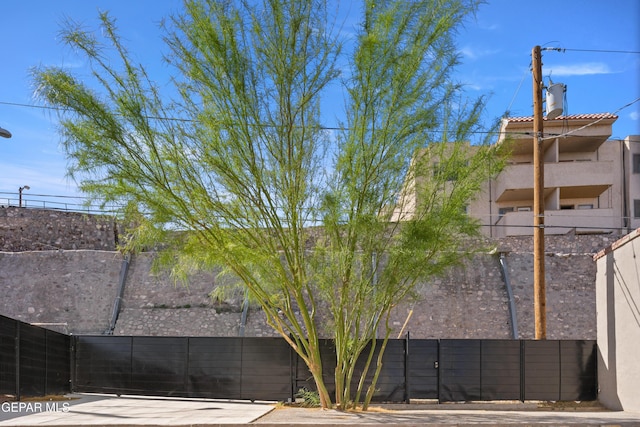 view of property featuring fence