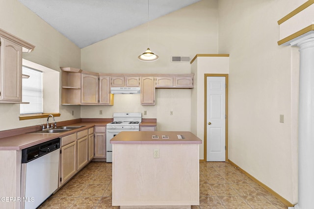 kitchen with under cabinet range hood, white gas range, visible vents, a sink, and dishwashing machine