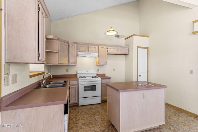 kitchen with a sink, high vaulted ceiling, visible vents, under cabinet range hood, and white gas stove