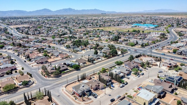 birds eye view of property featuring a residential view and a mountain view