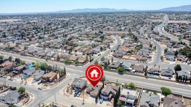 bird's eye view featuring a mountain view and a residential view