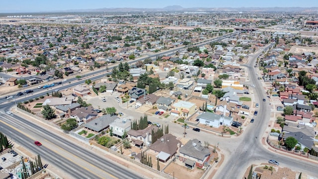 birds eye view of property with a residential view