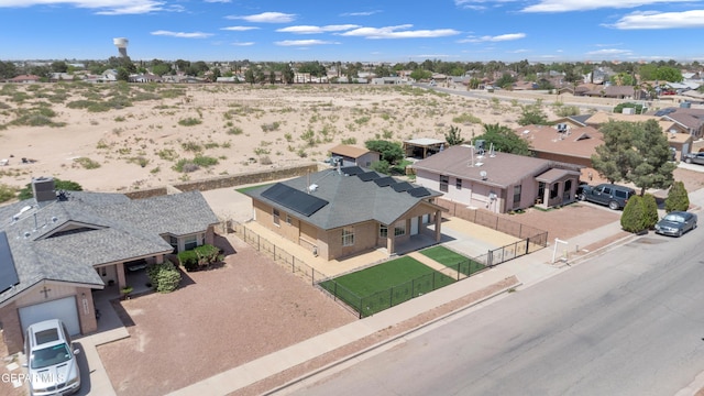aerial view featuring a residential view and a desert view