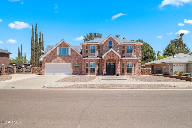 1829 Paseo Real Cir, El Paso, TX 79936 - traditional home with brick siding, fence, and driveway