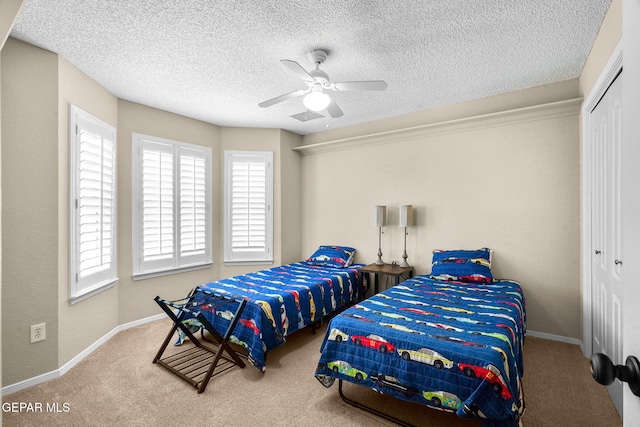 1829 Paseo Real Cir, El Paso, TX 79936 - bedroom with a closet, carpet flooring, baseboards, and multiple windows