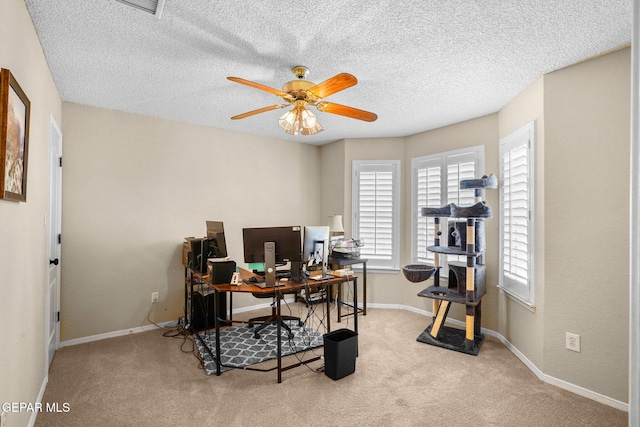 1829 Paseo Real Cir, El Paso, TX 79936 - office area with baseboards, a ceiling fan, carpet, and a textured ceiling