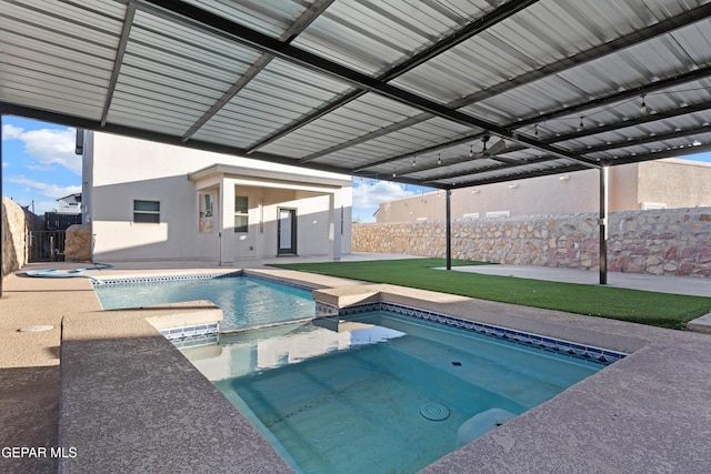 view of swimming pool featuring a patio, a fenced backyard, an in ground hot tub, and a fenced in pool