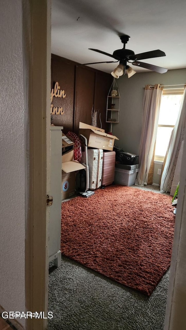 11325 Tom Ulozas Dr, El Paso, TX 79936 - carpeted bedroom with a ceiling fan