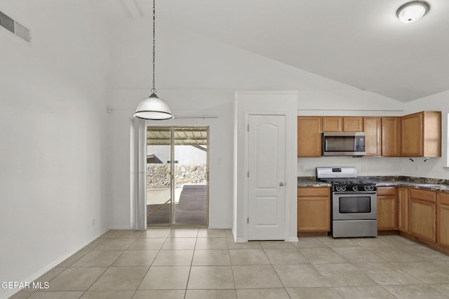 kitchen featuring dark countertops, high vaulted ceiling, stainless steel appliances, decorative light fixtures, and visible vents