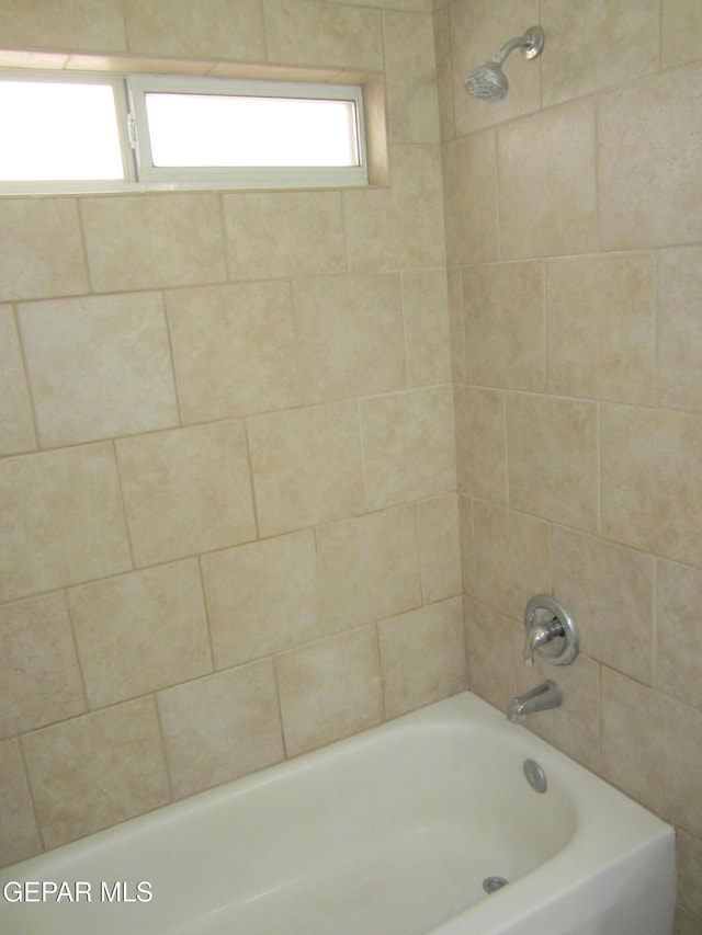 bathroom featuring tub / shower combination