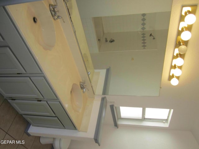 full bath with walk in shower and tile patterned floors