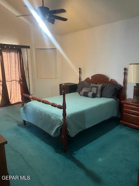 bedroom with carpet floors and a ceiling fan