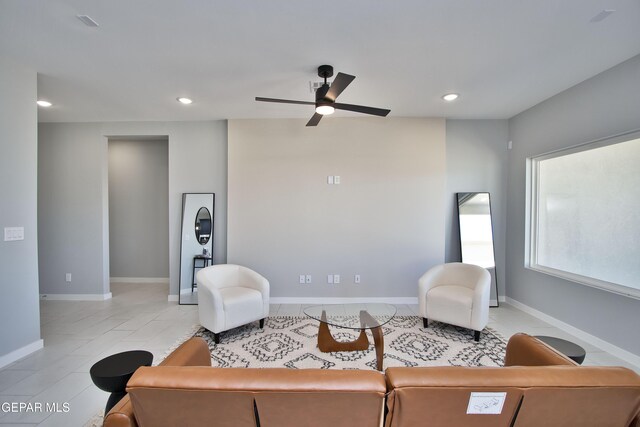 15237 Gauge Ct, El Paso, TX 79938 - living room featuring baseboards, recessed lighting, ceiling fan, and light tile patterned floors