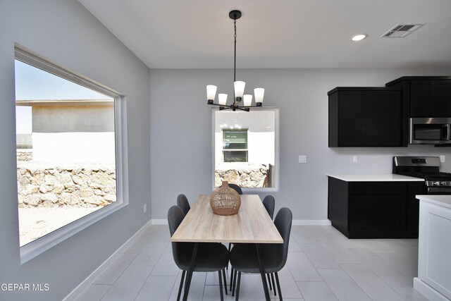 15237 Gauge Ct, El Paso, TX 79938 - dining room with visible vents, baseboards, an inviting chandelier, recessed lighting, and light tile patterned flooring