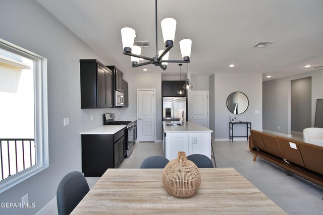 15237 Gauge Ct, El Paso, TX 79938 - dining room featuring visible vents, recessed lighting, light tile patterned floors, and a notable chandelier